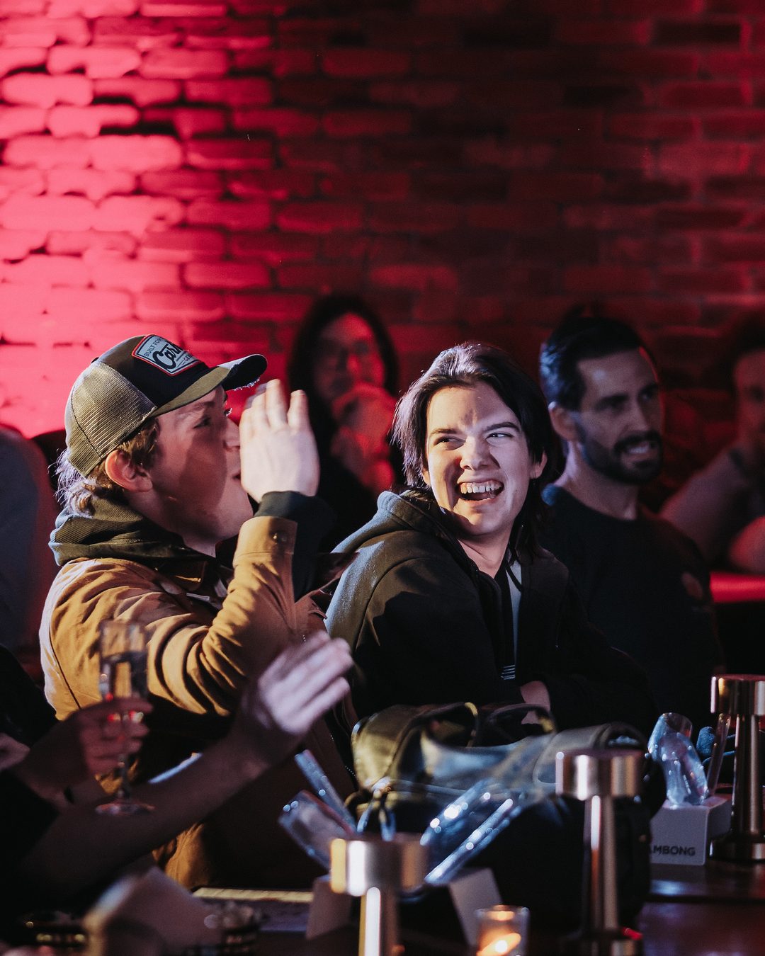 A group of friends laughing at a Laugh Lounge show